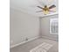 Well-lit bedroom with ceiling fan and neutral decor at 9826 Edinburgh Ln # 282, Charlotte, NC 28269