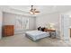 Main bedroom with plush carpet and neutral color palette at 9826 Edinburgh Ln # 282, Charlotte, NC 28269