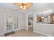 Breakfast nook with French doors leading to a patio and a view of the kitchen at 9826 Edinburgh Ln # 282, Charlotte, NC 28269