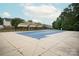 Community pool with covered patio area at 15634 Normans Landing Dr, Charlotte, NC 28273