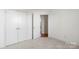 Well-lit bedroom with a large closet and access to bathroom at 10423 Brawley Ln, Charlotte, NC 28215