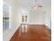 Spacious living room with French doors leading to the backyard at 10423 Brawley Ln, Charlotte, NC 28215