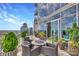 Outdoor balcony featuring city views, lounge seating, and potted plants at 215 N Pine St # 3705, Charlotte, NC 28202
