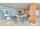 Modern residential bar featuring counter seating, art and beverage center at 215 N Pine St # 3705, Charlotte, NC 28202