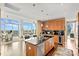 Modern kitchen with a breakfast bar, granite countertops, and stainless steel appliances at 215 N Pine St # 3705, Charlotte, NC 28202