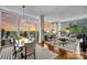 Bright, open living space with floor-to-ceiling windows and hardwood floors at 215 N Pine St # 3705, Charlotte, NC 28202