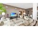 Elegant living room featuring stylish furniture, hardwood floors and an open-concept design at 215 N Pine St # 3705, Charlotte, NC 28202