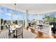 Bright, open living space with floor-to-ceiling windows and hardwood floors at 215 N Pine St # 3705, Charlotte, NC 28202