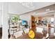 Open-concept living space with modern lighting, hardwood floors, and city views at 215 N Pine St # 3705, Charlotte, NC 28202