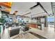 Modern residential lounge featuring bar, kitchen, city views and comfortable seating at 215 N Pine St # 3705, Charlotte, NC 28202