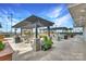Outdoor kitchen and seating area for entertaining with built-in grill, and TV at 215 N Pine St # 3705, Charlotte, NC 28202
