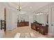 Primary bathroom with double vanities, granite countertops and a large mirror at 13824 Claysparrow Rd, Charlotte, NC 28278