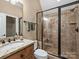 Clean bathroom with granite countertop and large shower at 13824 Claysparrow Rd, Charlotte, NC 28278