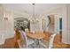 Elegant dining room with hardwood floors and chandelier at 13824 Claysparrow Rd, Charlotte, NC 28278