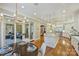 Large kitchen with white cabinetry, a large island, and stainless steel appliances at 13824 Claysparrow Rd, Charlotte, NC 28278