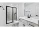 Modern bathroom featuring a glass shower, vanity with modern sink, and contemporary fixtures at 1609 Blanche St, Charlotte, NC 28262