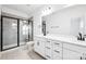 Modern bathroom with a glass shower, double vanity with modern sinks, and contemporary fixtures at 1609 Blanche St, Charlotte, NC 28262