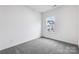 Bedroom with carpet, a window, white walls, and natural light at 1617 Blanche St, Charlotte, NC 28262