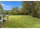 Large backyard with fenced perimeter and grassy area at 217 Burrage Ne Rd, Concord, NC 28025