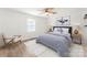 Spacious bedroom with light walls, new flooring, and plenty of natural light at 217 Burrage Ne Rd, Concord, NC 28025