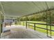 Covered wooden deck overlooking backyard at 217 Burrage Ne Rd, Concord, NC 28025