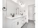 Primary bathroom featuring dual sinks, white cabinets, and a separate shower at 5735 Allburn Pkwy, Concord, NC 28027