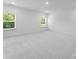 Spacious bedroom with plush carpeting, large windows with natural light at 5735 Allburn Pkwy, Concord, NC 28027