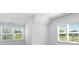 Bright bedroom with large windows and a high vaulted ceiling at 5735 Allburn Pkwy, Concord, NC 28027