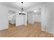 Formal dining area with hardwood floors and elegant trim at 5735 Allburn Pkwy, Concord, NC 28027