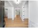 Welcoming entryway with a view into the spacious, open-concept living areas of the home at 5735 Allburn Pkwy, Concord, NC 28027