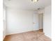 Simple bedroom with neutral wall paint and carpet flooring at 2074 Van Buren Rd, Sherrills Ford, NC 28673