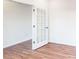 Open office area with hardwood floors and French doors at 2074 Van Buren Rd, Sherrills Ford, NC 28673