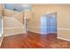 Open living area with hardwood floors and two-toned walls at 11434 Lamoille Ln, Charlotte, NC 28278