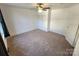 Bright bedroom with carpeted floor and ample closet space at 317 Kerr Nw St, Concord, NC 28025