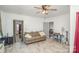 Cozy living room featuring a sofa, coffee table, and a fireplace at 317 Kerr Nw St, Concord, NC 28025