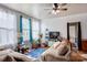 Living room featuring a blue rug and ample natural light at 317 Kerr Nw St, Concord, NC 28025