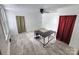 Home office with L-shaped desk and tile flooring at 317 Kerr Nw St, Concord, NC 28025