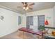 Spare bedroom with a massage table and ceiling fan at 317 Kerr Nw St, Concord, NC 28025