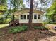 Back exterior of house featuring a deck, patio and greenery at 331 Sunderland Rd, Belmont, NC 28012