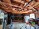 Unfinished garage interior with exposed rafters and unfinished walls at 331 Sunderland Rd, Belmont, NC 28012