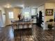 Open floor plan kitchen with island, farm sink, and stainless appliances at 331 Sunderland Rd, Belmont, NC 28012