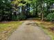 Scenic walking path winding through lush greenery, inviting leisurely strolls and outdoor adventures at 331 Sunderland Rd, Belmont, NC 28012