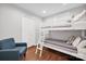 This bedroom features a bunk bed with wood floors, an armchair, and a large closet at 470 Lakeview Shores Loop, Mooresville, NC 28117