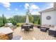 Spacious backyard patio with seating, grill, and beautiful landscaping at 494 Bowline Dr, Denver, NC 28037