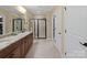 Large bathroom with double vanity, granite countertop, and shower at 494 Bowline Dr, Denver, NC 28037