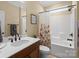 Clean bathroom with a shower/tub combo and modern vanity at 494 Bowline Dr, Denver, NC 28037