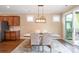 Bright dining room with hardwood floors and access to the patio at 494 Bowline Dr, Denver, NC 28037