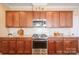 Modern kitchen with granite countertops and stainless steel appliances at 494 Bowline Dr, Denver, NC 28037