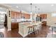 Modern kitchen boasts granite countertops, stainless steel appliances, and an island at 494 Bowline Dr, Denver, NC 28037