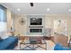 Living room featuring fireplace and built-in shelving at 494 Bowline Dr, Denver, NC 28037